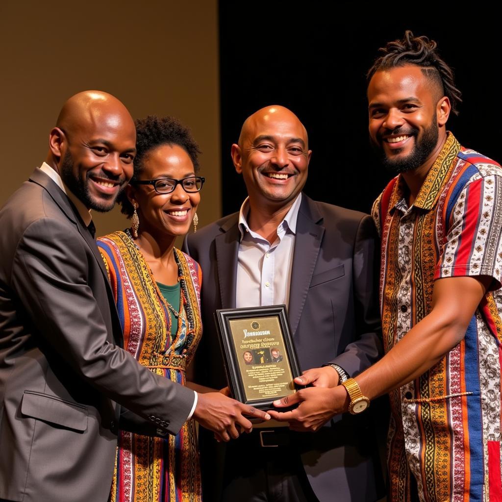 Amadodana Ase Wesile receiving an award