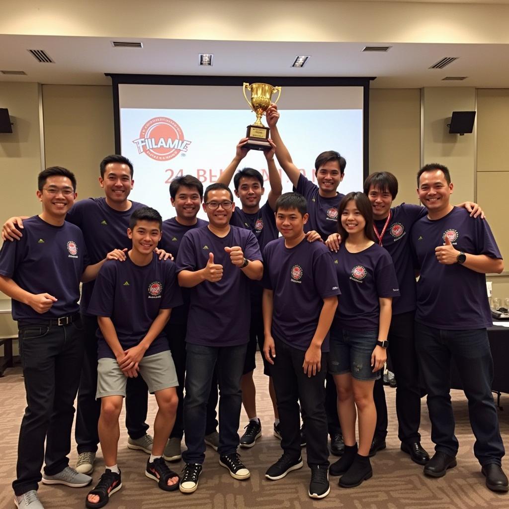 The winning team of Asean LOL 2015 hoisting the championship trophy