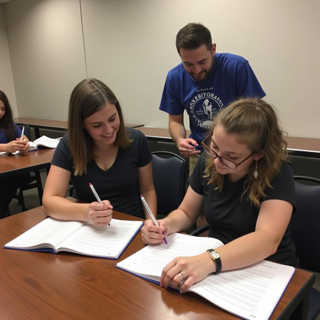 Students studying together for ASE exams