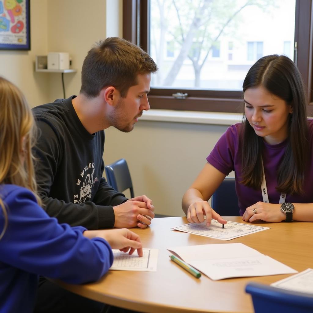 A teacher and student discussing a project in an ASE alternative school