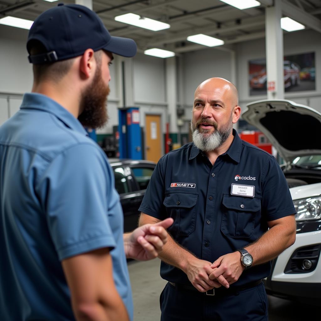 Customer Talking to ASE Certified Mechanic